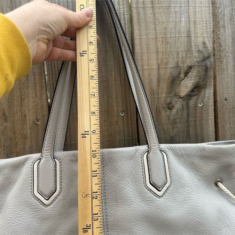 Kate Spade Pebbled Leather Tote Bag with Tassels & Zip Closure - Picture 13 of 14